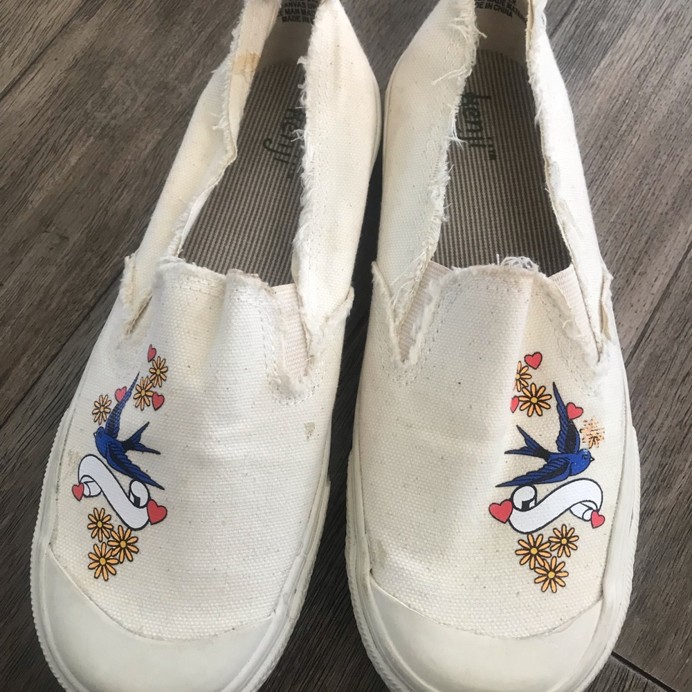 New. Never worn slip on sneakers